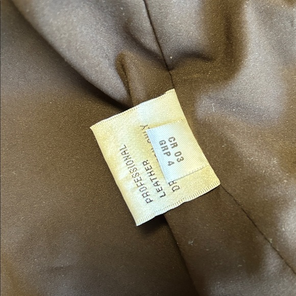 Fabulous St.John Butter Soft Leather
Jacket Embellished w/Brass
Grommets - Picture 13 of 17